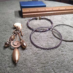 Golden ear dangler with trio of bracelets